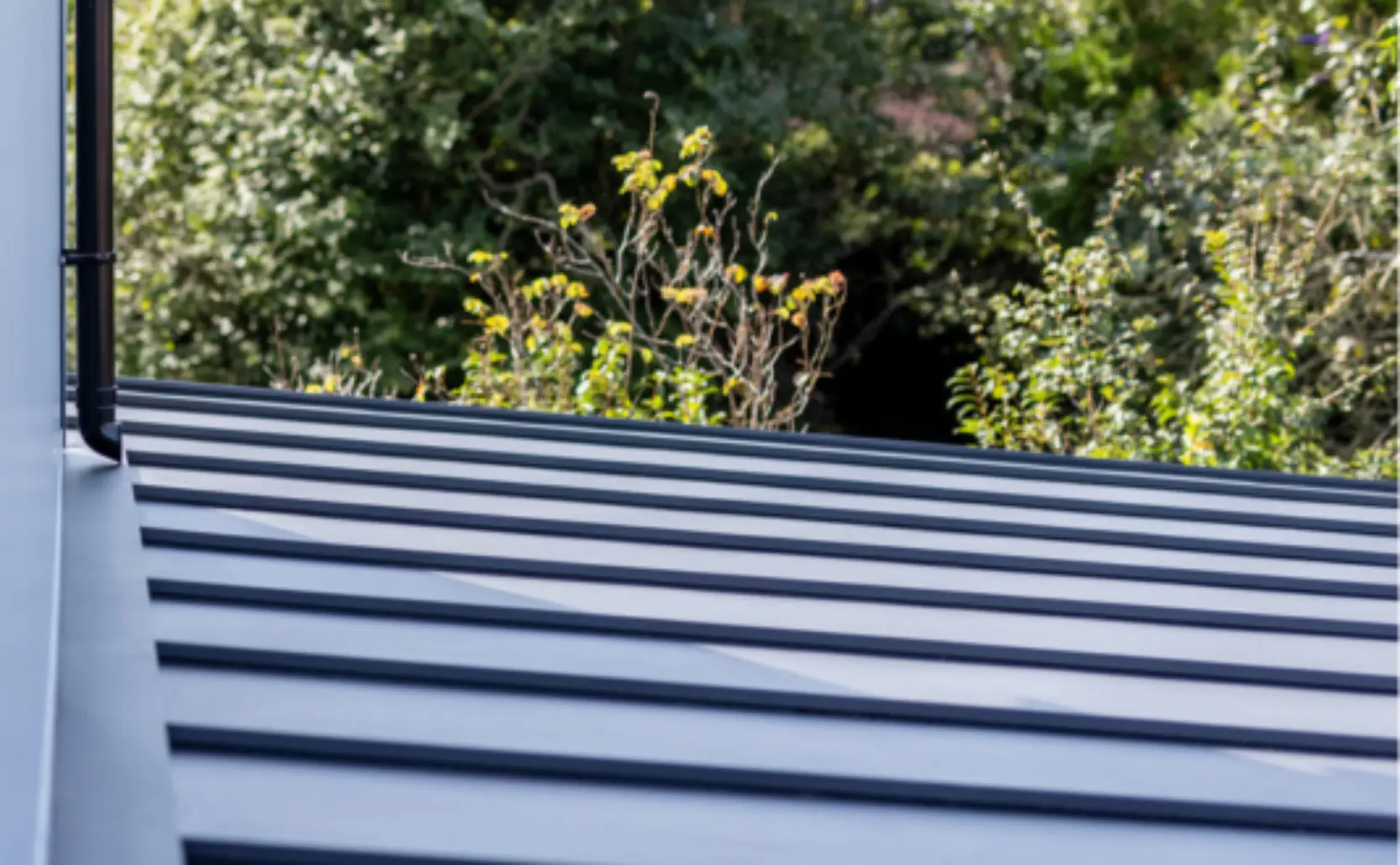 What is the Minimum Pitch for a Metal Roof? Image of a low pitch roof